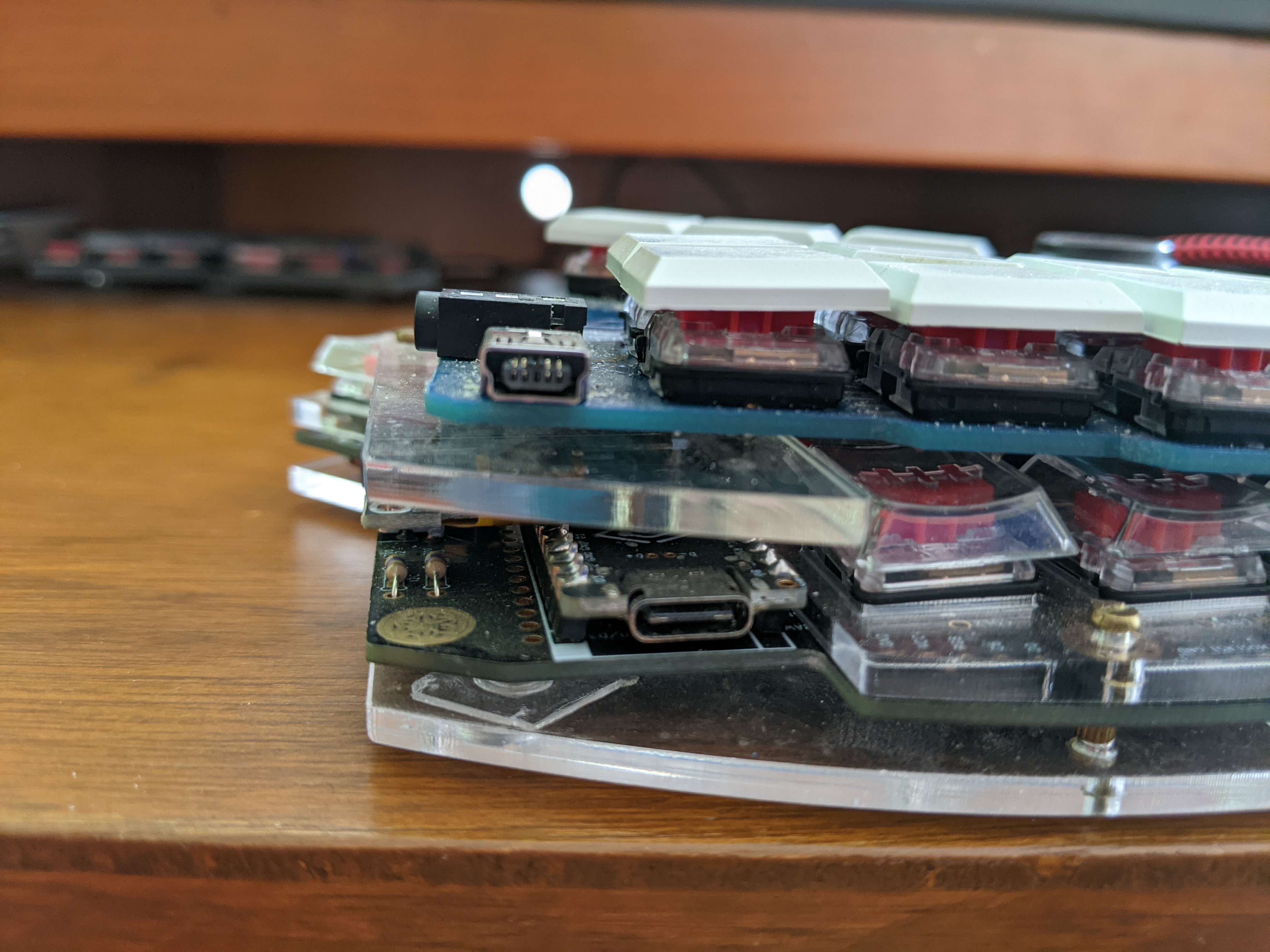 Stack of various mechanical keyboards