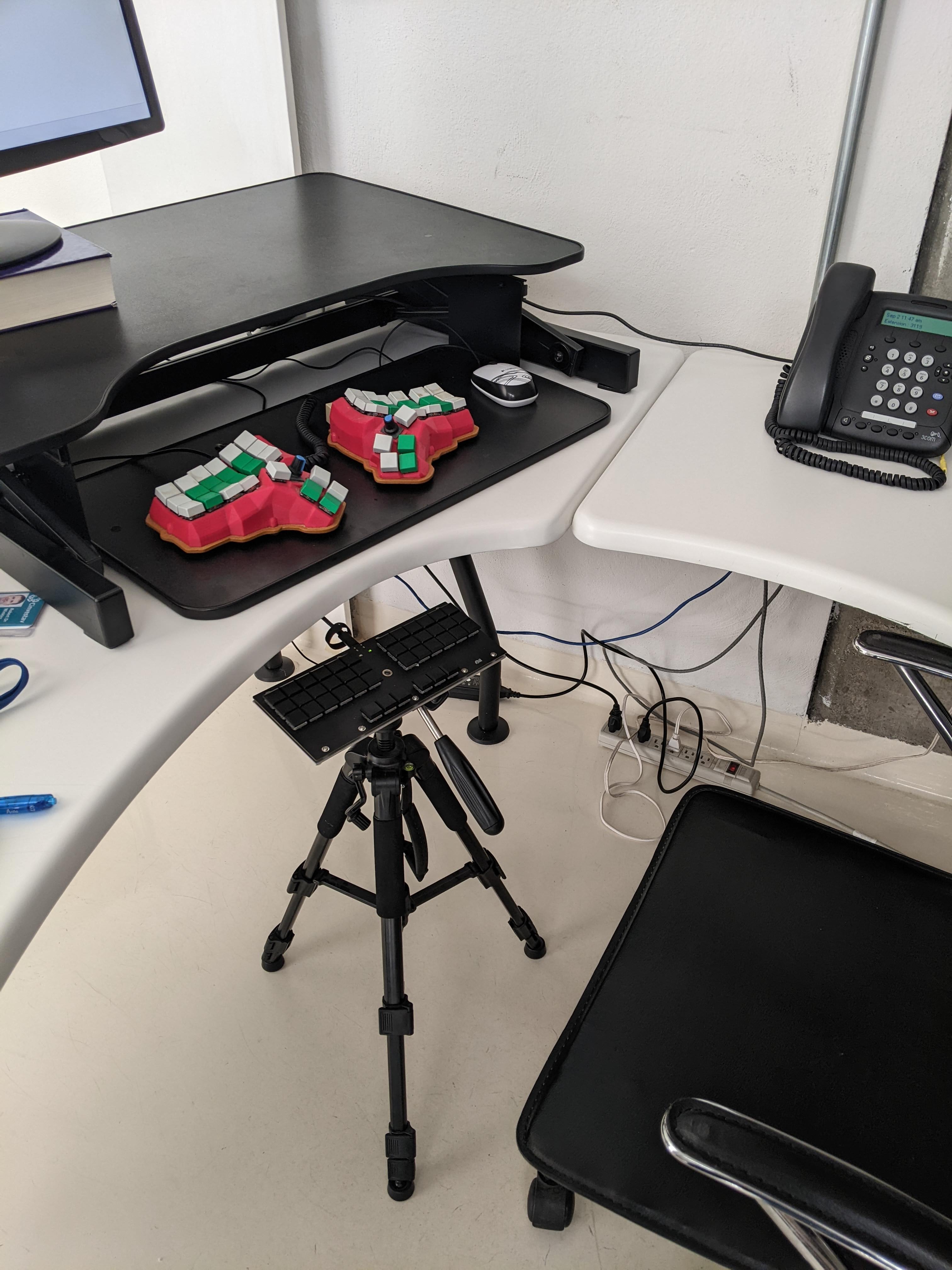 Office workspace with multiple keyboards